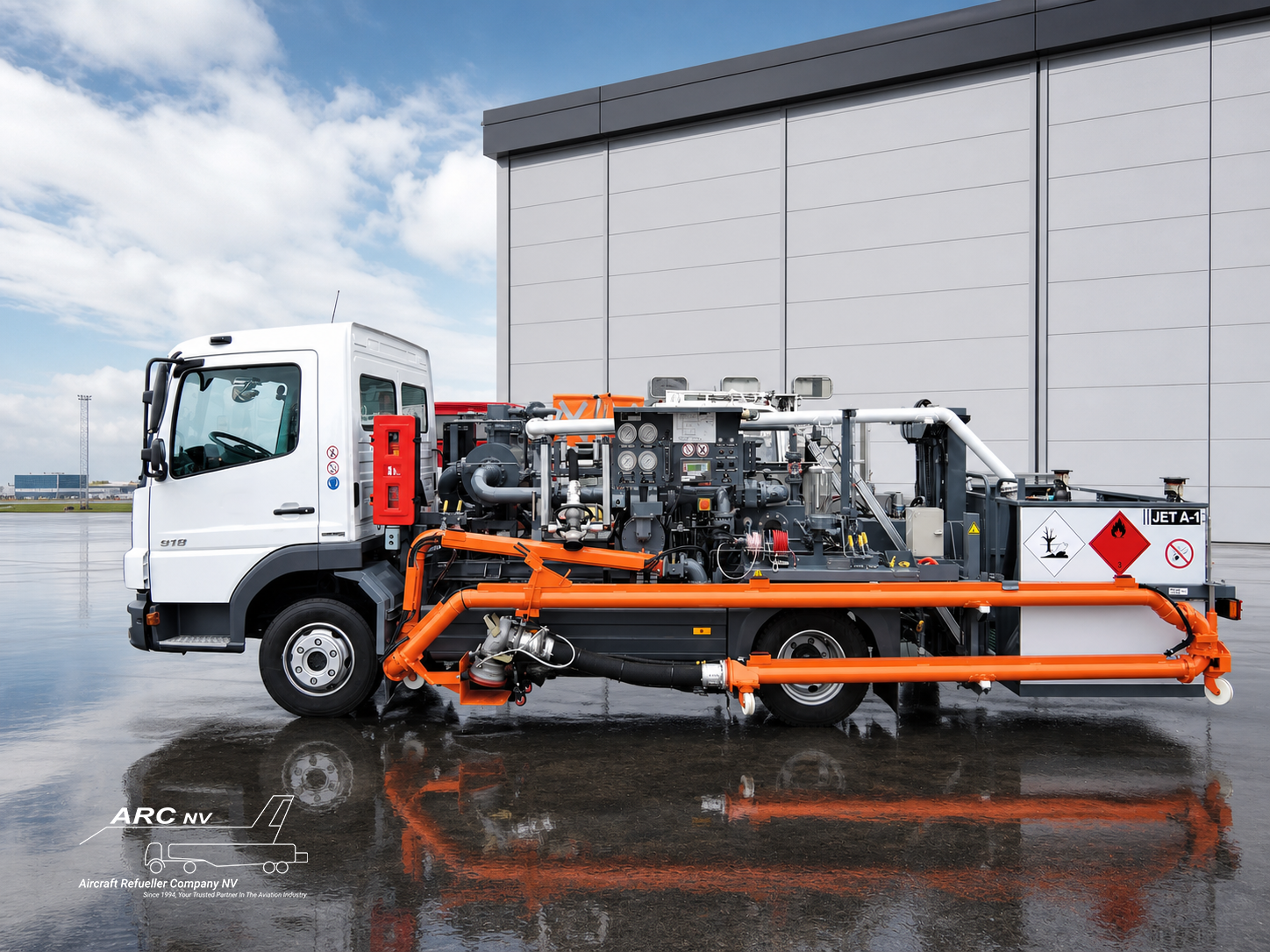 ARC NV aircraft hydrant dispenser in side profile, showing the open fuelling module, filtration and metering equipment, control panel, orange hoses and Jet A-1 markings on an airport apron.